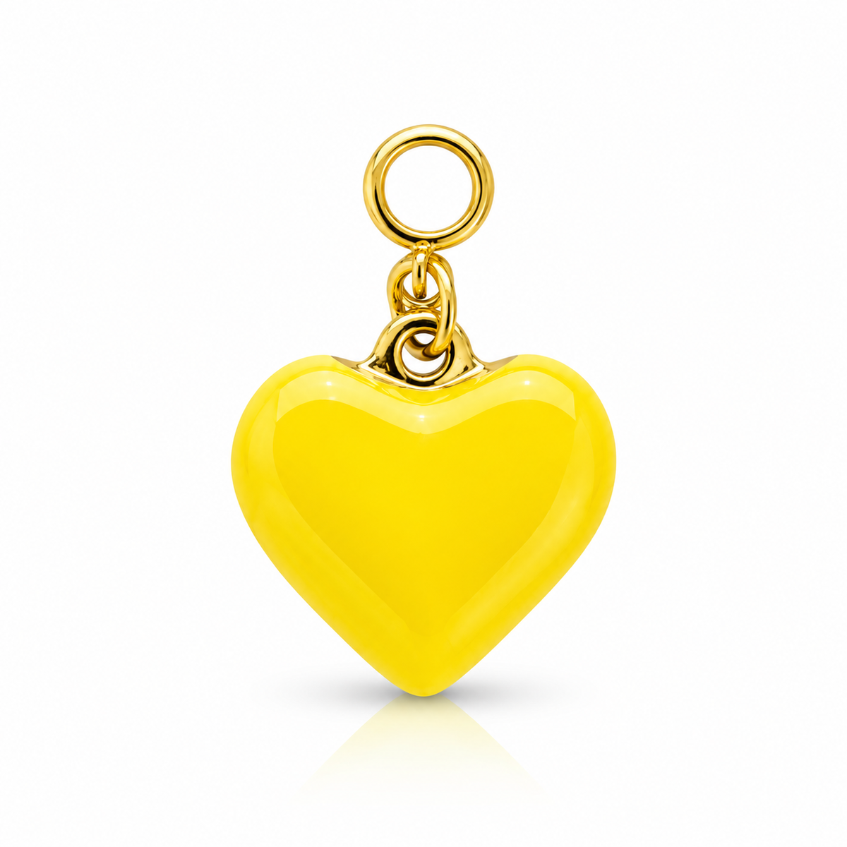 A bright yellow heart-shaped pendant charm with a polished gold-tone metal loop at the top, shown on a clean white background with a soft reflection underneath.